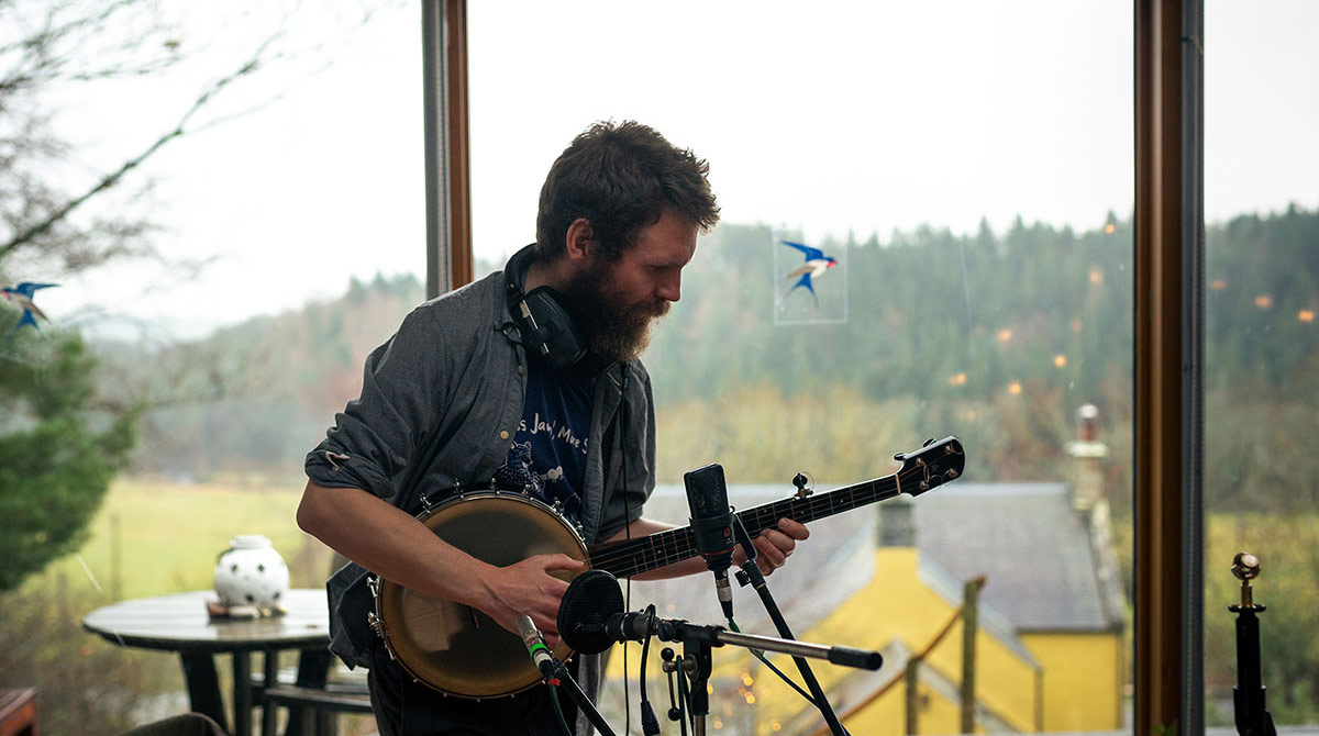 Michael Starkey playing banjo at Heriot Toun Studio